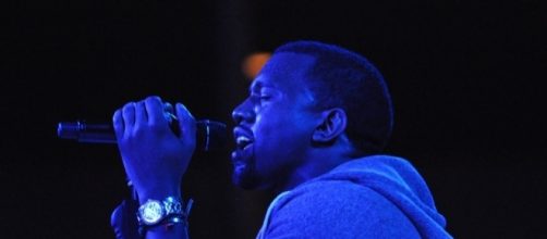 Kanye West performing onstage. [Image Credit: Jason Perrse/Flickr]