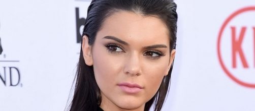 Kendall Jenner poses for photographs. [Image Credit: Disney ABC Television/Flickr]