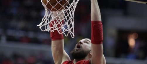 The Toronto Raptors might decide to trade Jonas Valanciunas to avoid paying luxury tax next year. (Photo via Keith Allison, Flickr CC)