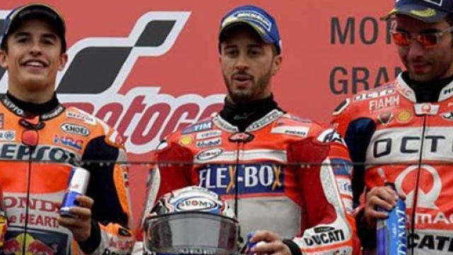 Il podio in Giappone: da sinistra Marquez, Dovizioso e Petrucci