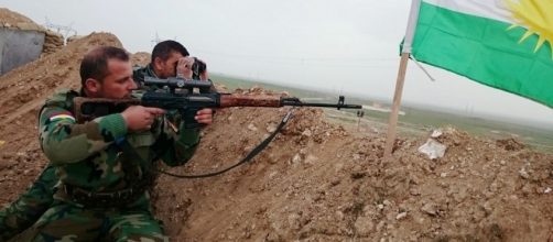 Peshmerga fighter in 2015 / [Image credit: Kurdishstruggle/Flickr]