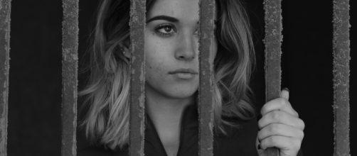 A girl in jail / caseyzschach via Flickr