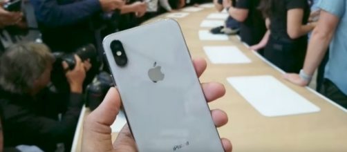 The two companies are rivals but also rely on each other. [Image via Engadget/YouTube screencap]