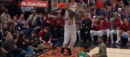 LeBron James and the Cavs won their season opening game 102-99 against the Boston Celtics. [Image via NBA/YouTube]