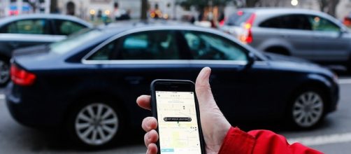 Summoning an Uber [imagh courtesy of Mark Warner flickr]