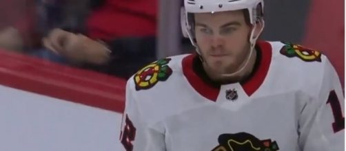 Alex DeBrincat scores in preseason play. [Image via Gybon B/YouTube]