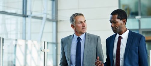 New Age Global Investor sealing a deal with an African Partner. PHOTO/ Flickr Credit: KenanFlagler