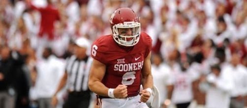 Baker Mayfield threw for over 400 yards and three touchdowns in OU's win over K-State on Saturday. [Image via atha2k2/YouTube screencap]