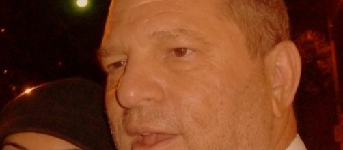 Harvey Weinstein poses with a fan. [Image Credit: GabboT/Flickr]