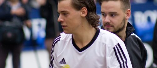 Harry Styles playing football with fellow celebrities. [Image Credit: vagueonthehow/Flickr]