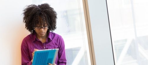 Black women can keep to themselves without being aggressive. (via Flickr / WOCinTech Chat)