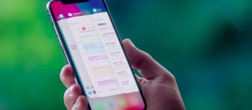 The phone's slow production means there won't be many units available for in-store purchase. [Image via Apple/YouTube screencap]