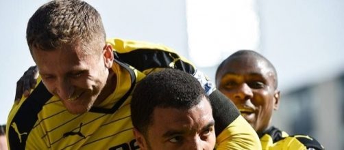 Watford palyers celebrate a goal in the past. (Image Credit: MekyCM/Flickr)