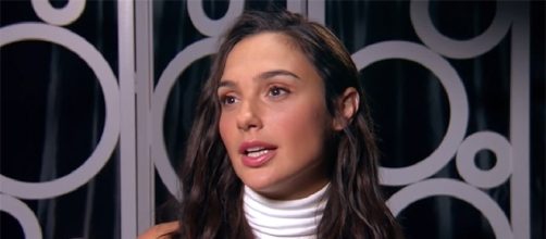 Gal Gadot will not be presenting Brett Ratner with his Tree of Life Award. (E! Live from the Red Carpet/YouTube)