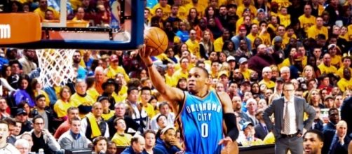 Russell Westbrook goes hard to the basket (Image Credit: Erick Drost/Flickr)