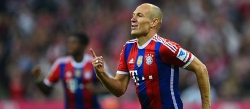 Bayern Munich forwarder Arjen Robben celebrates his goal in a past match. (Image Credit: James Kuslov/Flickr)