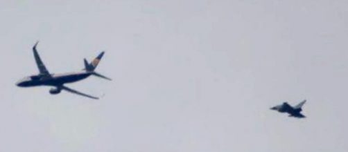 A Ryanair flight was diverted to London Stansted over bomb threat hoax and escorted by RAF fighter jets [Image: YouTube/NEWS UPDATE]