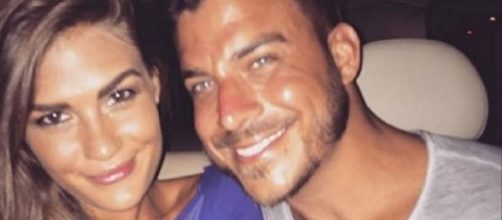 Brittany Cartwright and Jax Taylor pose in a car. [Photo via Instagram]