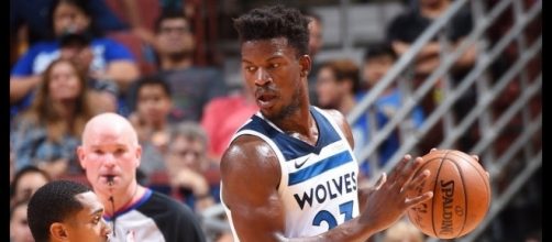 Jimmy Butler and the Timberwolves battle the Golden State Warriors in China as part of the 2017 NBA preseason. [Image via NBA/YouTube]