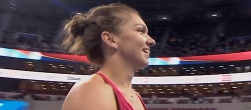 Simona Halep celebrating her win against Maria Sharapova. (Image Credit: WTA/YouTube)