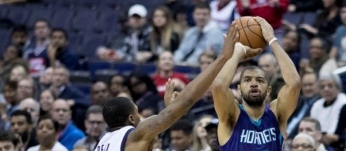 Nicolas Batum averaged 15.1 points, 6.2 boards and 5.9 assists in 77 games last season [Image via Keith Allison/WikiCommons]