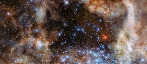 The weird dip in light of star KIC 8462852 could be due to a giant dust cloud, Image - ESA/Hubble CC BY 4.0 Wikimedia Commons