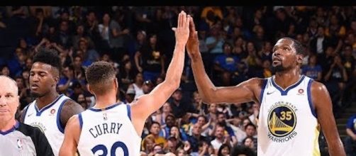 Golden State tries to capture their first win of the NBA preseason on Sunday morning when they face Minnesota. [Image via NBA/YouTube screencap]