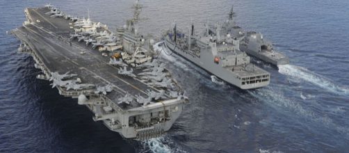 USS Theodore Roosevelt with Japanese Akizuki-class destroyer. (Image credit - Chad M. Trudeau, Wikimedia Commons)