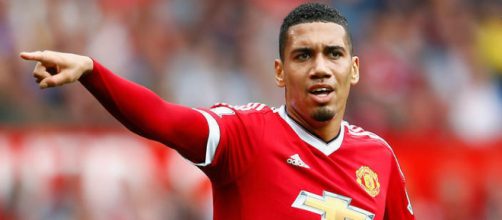 Manchester United defender, Chris Smalling representing his team in a past match. (Image via Man trinh dien/Flickr)