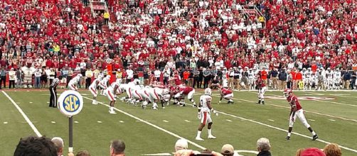 Alabama and Auburn battle in the Iron Bowl (via Wikimedia Commons - Brandon Rush)