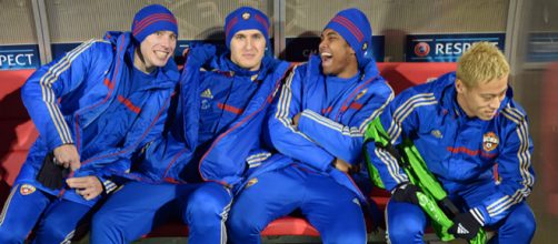 CSKA Moscow players including Keisuke Honda sit on the bench during a previous match. (Image via Ryu Voelkel/Flickr)