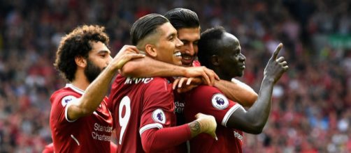 Liverpool players celebrate Sadio Mane's goal in the past. (Image Credit: Cakeor Death/Flickr)