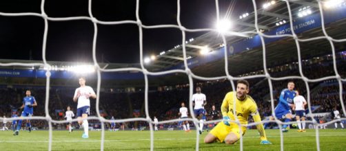 Jamie Vardy, right, watches how his volley goes over Hugo Lloris and open the score of the game. Photo: Carl Recine/Action Images via Reuters