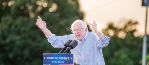 Bernie Sanders visits Canada after introducing health care bill. [Image via Flickr/Hillel Steinberg]