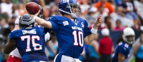 Eli Manning of the New York Giants [Image by Tech. Sgt. Michael Holzworth / Wikimedia Commons]