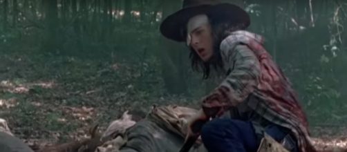 Carl and Siddiq got attacked by walkers. - [The Walking Dead Updates HD / YouTube screencap]