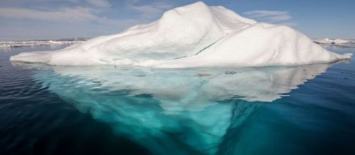 When the polar sea is calm, the underside of icebergs can easily be observed in the clear waters of the Arctic Ocean. (Wikimeda Commons/AWeith)