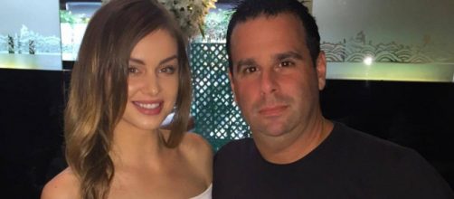 Lala Kent and Randall Emmett pose at a restaurant. [Photo via Flickr]