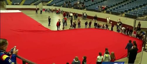 Sedalia, Missouri is hoping for the Guinness World Record for the largest Christmas stocking [Image credit KMBC 9 News Kansas City/YouTube]