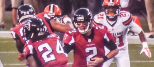 The Falcons will win the NFC South by winning their last two games. Image Source: Flickr | Eric Drost