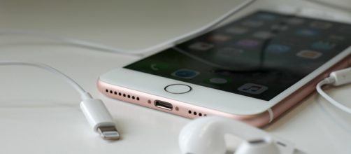 An iPhone in action. - [Image Credit: Karlis Dambrans/Flickr]