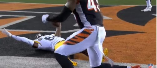 Brown falls after getting hit in the endzone - image - NFL / Youtube