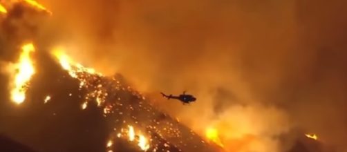 Fire encroaching upon Santa Paula, Ca in the AM hours. - [Artnewsive / YouTube screencap]