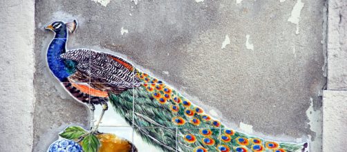 Street art is different from graffiti and represents an important part of neighborhood culture (image source Wegmann via wikimedia commons)