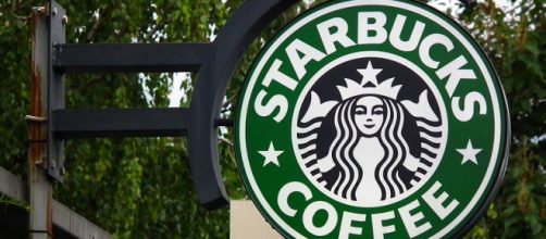 Starbucks storefront. - [Image Credit: 4028mdk09/Wikimedia Commons]