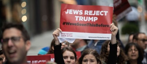 Protesters outside Trump Tower in New York, September 2016. / Photo by Drew Angerer, Blasting News library