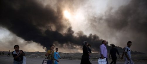 Iraqi Forces Advance On Mosul; IS Militants Attack Western Iraqi Town - rferl.org