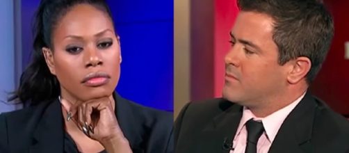 Cox confronts anti-LGBT activist (source: YouTube)