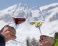 Drinking wine on the Dolomites, after a skiing day