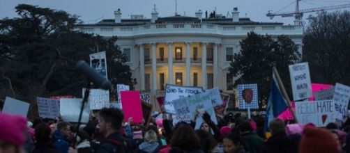 Anti-Trump Women's march protesters gather in front of White House. /Photo by Zach Gibson, Blasting News library